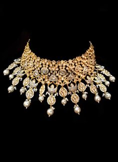 Indian bridal set makes every bride's outfit perfect. Clear Kundans adorn a hammered gold plated metal alloy. Beautiful grey shaded coating makes this bridal set special. This grey jewelry set is sure to make you stand out from the crowd. This necklace set comes along with a beautiful pair of Jhumka earrings & maang tikka with Kundan to match. Our Bridal collection is handmade with love & care. It makes us super happy to be part of your special day. The approximate earrings length is 3.5 Bridal Look Indian, Grey Jewelry, Gray Jewelry, Maang Tikka, Choker Set, Bridal Jewellery Indian, Hammered Gold, Jhumka Earrings, Bride Clothes