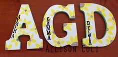 the word agd is made up of letters and flowers