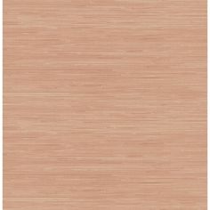 an area rug with light brown and beige colors