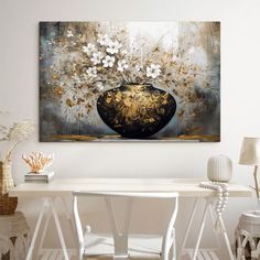 a painting on the wall above a white table