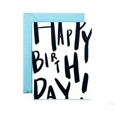 a card with the words happy birthday written in black ink on a blue envelope paper