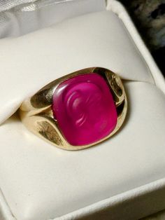 Deco 10K Synthetic Ruby Cameo RING, Circa 1930's  SIZE 13               90 year old statement ring will catch all eyes! 10K Gold, large, size 13                                   The cameo can be used on a hot wax seal!        NEXT time you send her that love noteMake this your romantic signature by dripping                 scented candle wax over the seal, and pressing your ring cameo into it!                                        THAT WILL PUT A SMILE ON HER FACE!                                                 FREE SHIPPING in the USA! Cameo Ring, All Eyes, Tucson Az, Wax Seal, Wax Seals, Candle Wax, All About Eyes, Scented Candle, 10k Gold