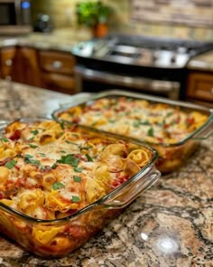 two casserole dishes sitting on top of a kitchen counter