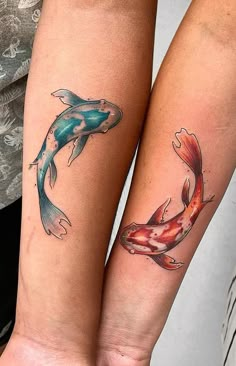 two koi fish tattoo designs on both arms