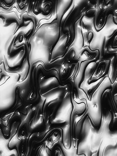 an abstract image of black and white liquid or water with some interesting patterns on it