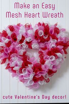 a valentine's day card with a heart shaped wreath