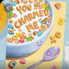 a bowl of cereal with the words you got charmed me on it next to a spoon