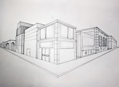 a drawing of some buildings on a white paper