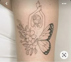 a woman's arm with a butterfly and flower tattoo on the left side of her body