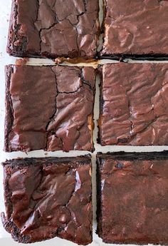 chocolate brownies cut into squares on top of each other