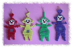 three beaded cartoon characters hanging from hooks on a pink background, one is wearing an earring and the other two are wearing earrings with beads