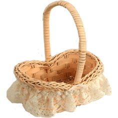 a wicker basket sitting on top of a white table next to a stone slab