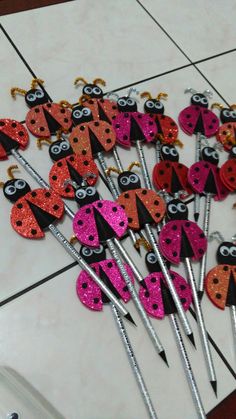 there are many ladybug picks on the table