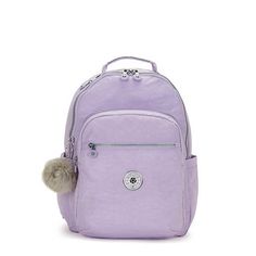 Our best-selling backpack that highlights all of the iconic features and benefits Kipling is known for. The Seoul backpack is equipped with padded shoulder straps, a durable exterior and roomy interior. Easily fits all of life’s essentials (big & small), plus it has a built-in protective sleeve for your laptop, too! Purple School Bag, Water Resistant Backpack, Kipling Bags, Cheap Fabric, School Backpack, Pocket Top, Carry On Luggage, Backpack Straps, Grade 2