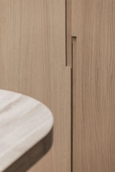 a close up of a wooden cabinet with drawers