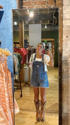 Overall And Boots Outfit, Overall And Cowboy Boots, Cowboy Boots With Midi Skirt, Western Inspired Work Outfits, Lyla Garrity Outfits, Shania Twain Outfits 90s, Texas Outfit Aesthetic, Cool Cowboy Boots Outfit, Nashville In Fall Outfits