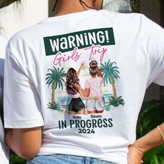 two people wearing t - shirts that say, warning girls try to stay in progress