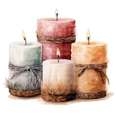 three different colored candles sitting next to each other on top of a white surface and tied with twine