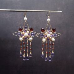 Handmade Red Chandelier Earrings For Wedding, Red Handmade Chandelier Earrings For Weddings, Handmade Purple Earrings For Festive Occasions, Elegant Handmade Crystal Earrings For Celebration, Festive Handmade Purple Earrings, Handmade Elegant Dangle Flower Earrings, Elegant Handmade Dangle Flower Earrings, Elegant Red Flower Earrings For Festive Occasions, Elegant Wire Wrapped Beaded Earrings