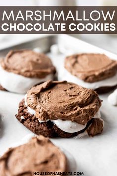 marshmallow chocolate cookies on a baking sheet with the title text overlay above it