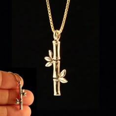 This jointed Bamboo Charm is simple and elegant. The three dimensional charms is 1 1/4" long and is cast in solid 14k gold.In Asian culture, bamboo is a symbol of beauty, harmony, virtue and good luck.Scientifically it is one of the fasted growing growing plants in the world. Bamboo is a grass and there are nearly 1500 species.All Marty Magic Charms and Pendents include an 18 inch (46cm) box chain. If you would prefer a different length of chain please feel free to contact me.This item usually s Opalite Jewelry, Bamboo Necklace, Bamboo Jewelry, Magic Charms, Bamboo Stick, Ocean Inspired Jewelry, Lucky Jewelry, Fish Jewelry, Art Jewelry Design