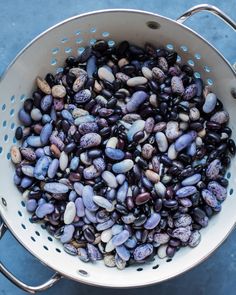 a large pot filled with lots of black beans