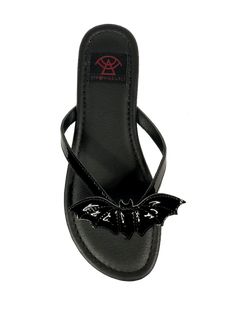 BAT! Introducing BETTY BAT, the perfect summer sandal with a sleek black vegan patent leather upper, luxurious black vegan leather lining, intricate black vegan patent leather BAT detail, and a durable black rubber outsole. Goth Flip Flops, Shoes For Me, Summer Sandals, Gothic Heels, Gothic Shoes, Black Betty, Clothing Patches, Shoe Inspo, Mary Jane Shoes