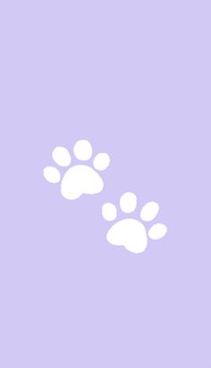 an animal's paw prints on a light purple background