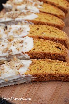 slices of cake sitting on top of a wooden cutting board