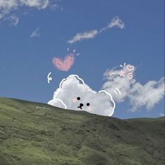 there are clouds and butterflies flying in the sky over a grassy hill with a pink butterfly on it