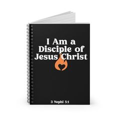 a spiral notebook with the words i am a disciple of jesus's christ on it