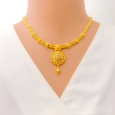 This 22k gold necklace set features an extravagant checkered drop design, radiating opulence and elegance. Weighing 30.0 grams, the set boasts a luminous yellow gold finish with a 16-inch necklace, adjustable by 1.75-inch links, and secured with a hook lock. The set includes matching earrings, each 1.75 inches long with screw-back posts for secure and comfortable wear. The intricate checkered pattern combined with the luxurious drop design makes this set perfect for those who appreciate bold and sophisticated jewelry, ideal for grand occasions and statement looks. PRODUCT DETAILS Gold Purity(karat): 22k Gold Weight(grams): 30.0 Item Finish: Yellow Gold Set Length: 16" Drop Length: 1.8" Adjustable Links: 1.75" Links Lock Style: Hook Lock Matching Earrings: Included Earring Length: 1.75" Ear Luxury Yellow Gold Jewelry With Zari Work, Hand Set 22k Gold Luxury Necklace, Yellow Gold Plated Jewelry Sets For Formal Occasions, Formal Yellow Gold-plated Jewelry Sets, Elegant Gold Plated Yellow Bridal Necklace, Elegant Yellow Gold Plated Bridal Necklace, Elegant 22k Gold Yellow Chain Necklace, Festive Yellow Gold-plated Necklaces, Formal Yellow 22k Gold Jewelry