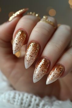 French manicure with a sparkly gold glitter tip. Glitter Nails For Wedding, Gold And Silver Christmas Nails, Gold And Silver Nails Ideas, Sparkly Nails Gold, Almond Gold French Tip Nails, White And Gold Winter Nails, Gold Christmas Nail Designs, Silver And Gold Nail Designs, Fall Nails Sparkly