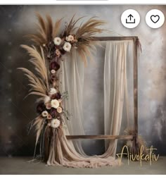 a photo frame with flowers and feathers on it