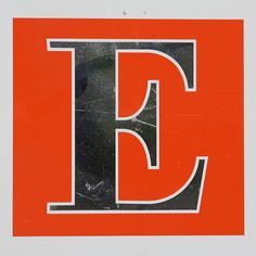 the letter d is made up of black and orange letters