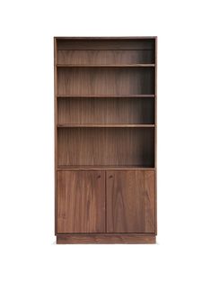 a wooden bookcase with three doors and two drawers on the bottom, one door open