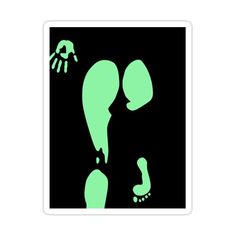 a green sticker with an image of two feet and a skull