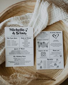 two wedding program cards sitting on top of a wooden bowl