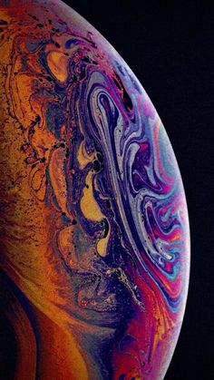 an iphone with colorful swirls on it