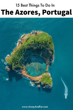 an island in the middle of blue water