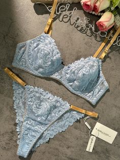 Experience elegance with our light blue lace lingerie set. Delicate embroidery and soothing blue hues create a fresh, comfortable ensemble. Adjustable yellow straps add a touch of style. Embrace comfort and charm in every wear. 🌸💙 Material: Made of 95% polyester, 5% spandex. Exquisite Embroidery Design: The lingerie set features intricate embroidery, adding delicate patterns for an alluring appeal. Comfortable and Form-Fitting: Lightweight Padded-free Underwire Bra. Crafted from soft and smoot Honeymoon Trip, Lingerie Brands, Lingerie Party, Delicate Embroidery, Fishnet Stockings, Lace Lingerie Set, Blue Soft, Red Lingerie, Intricate Embroidery