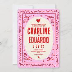 a pink and white wedding card with red lettering