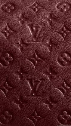 a close up view of the leather texture on a louis vuitton handbag