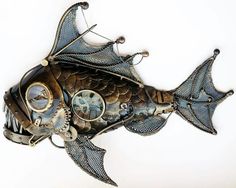 a fish made out of metal with gears attached to it's body and eyes