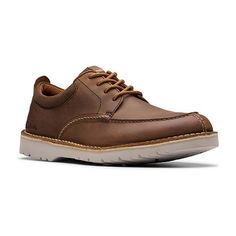 These Clarks men's Eastridge oxford shoes are a smart everyday choice. Made from pebbled leather, these lace-up shoes are designed for comfort with a cushioned sole and a flat sturdy heel. Wear them with pants or jeans. Closure Type: Lace-UpShoe Heel Height: 1 InchUpper/Outer Base Material: 100% LeatherShoe Lining Material: TextileSole Material Content: 100% EvaToe Type: Moc Toe, Closed ToeCare: Spot CleanHeel Style: Flat HeelCountry of Origin: Imported Oxford Shoes Brown, Shoes Oxford, Shoes Brown, Lace Up Shoes, Pebbled Leather, Oxford Shoes, Heel Height, Men's Shoes, Oxford