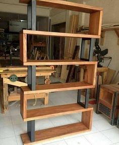 the shelves are made out of wood and metal