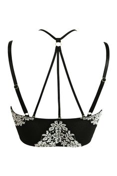 UnderwiredNon-paddedLongline bralette shapeFront fastening hook and eye detailsBeautiful two-tone floss laceRacer-back styleAdjustable strapsWorn to be seenDecorate your body in luxurious lace with the India Two-Tone Floss Front Fastening Bralette. This underwired, racerback style features a supportive and stylish hook-and-eye fastening as well as adjustable straps. Worn as a beautiful set or worn to be seen with your favourite jeans or skirt, this tantalising non-padded bralette can be more sty Lace Underbust Bra With Lace Closure, Underbust Bra With Lace Closure, Evening Lace Bra With Adjustable Straps, Lace Trim Evening Bra, Elegant White Crop Top With Adjustable Straps, Evening Lace Bra With Lace Closure, Evening Lace Underwire Bra, White Lace Bra With Adjustable Straps, Fitted Lace Bra With Spaghetti Straps