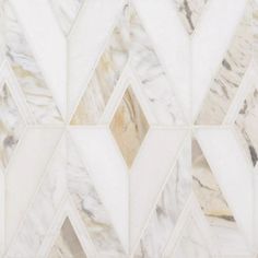 a white and beige marble wallpaper with an abstract geometric design on it's side