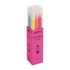 four different colored pens in a pink box on a white background with the words omy