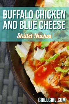 buffalo chicken and blue cheese skillet nachos in a cast iron skillet